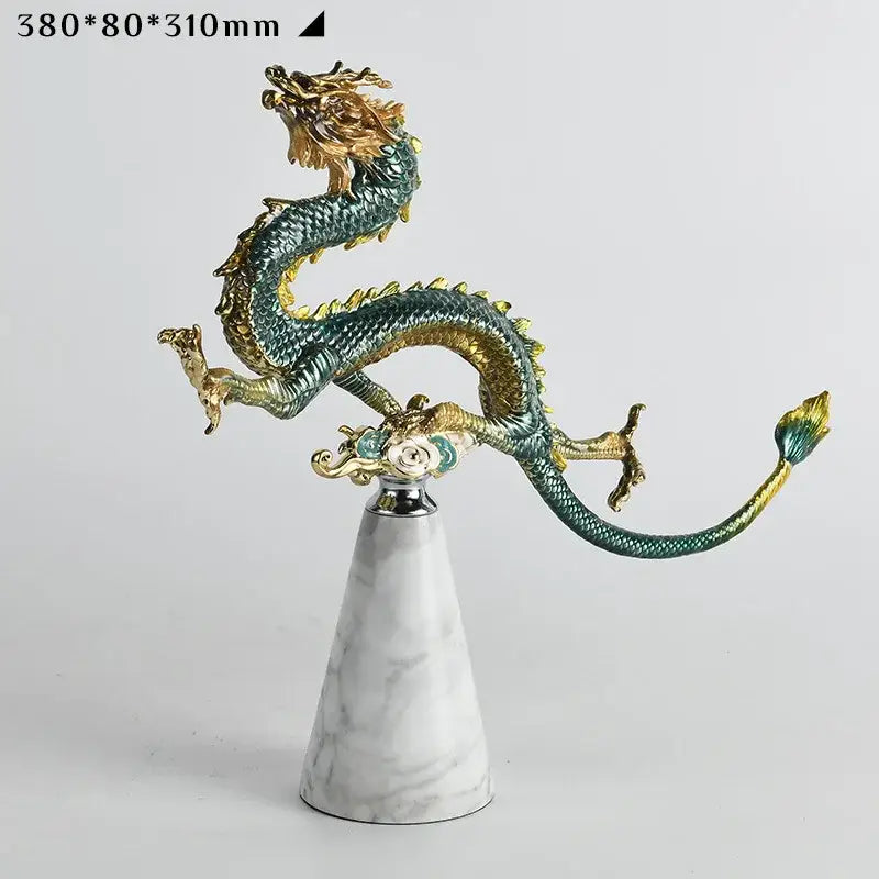 Detailed decorbites chinese dragon figurine with metallic green and gold accents on white marble base for home decor