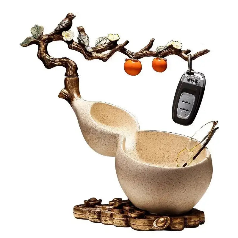 Beige ceramic gourd desktop storage decoration with sculpted branch top featuring birds blossoms and orange fruits