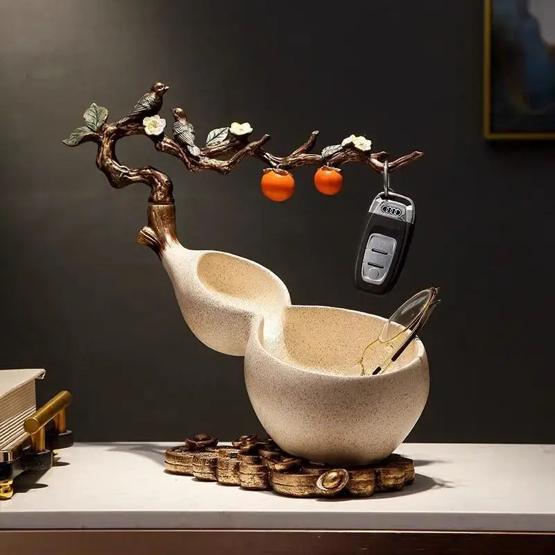 Beige ceramic gourd desktop storage decoration with bronze branch, birds, blossoms, and orange fruits for wealth attraction