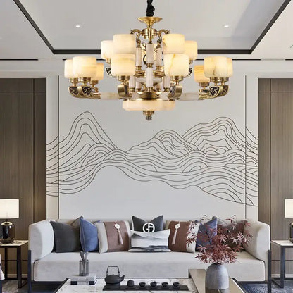 Gold-toned decorbites jade chandelier with multiple frosted glass shades for modern living room and restaurant décor