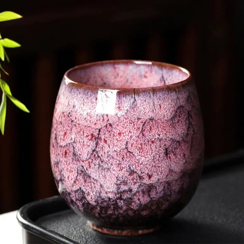 A handcrafted ceramic coffee cup from decorbites™ with vibrant purple and pink crackled glaze in a 250ml coffee cup set