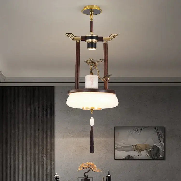 Decorbites chinese lantern chandelier with dark wood, brass accents, frosted glass shade, and decorative tassels for living room