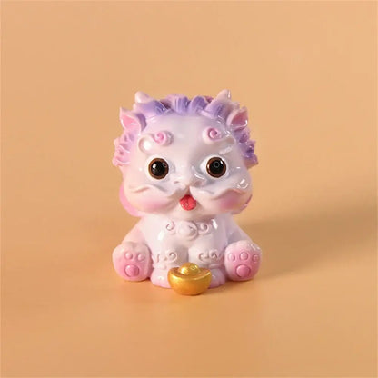 Decorbites™ glossy white and lavender ceramic mythology lion figurine with pink accents and golden ingot for luck and wealth