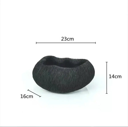 Black textured hair bun shown with decorbites chinese retro blue and white porcelain vase flower arrangement home decor