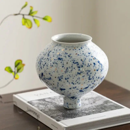 DecorBites™ chinese retro ceramic vase with white body blue and gold speckles rounded shape short pedestal base