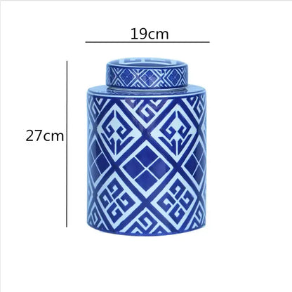 A tall cylindrical ceramic jar with lid in blue and white geometric patterns from decorbites chinese retro ceramics golden collection