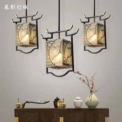 Three elegant black metal lanterns with hand-painted floral glass panels for decorative hall bedroom bedside use