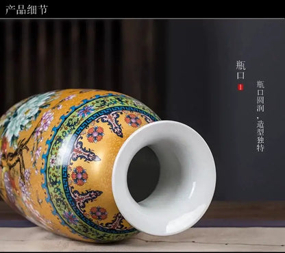 A vibrant yellow porcelain enamel colored vase with intricate floral and traditional Chinese motifs by DecorBites™