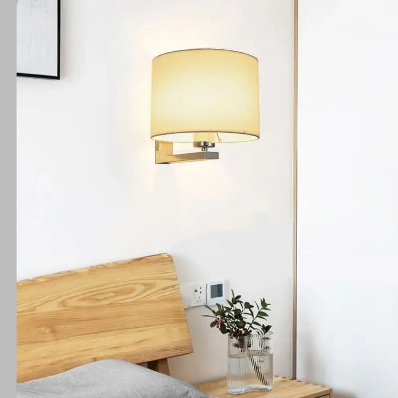 DecorBites™ Chinese style wall lamp with warm beige cloth cover and sleek metallic fixture for bedroom and living room