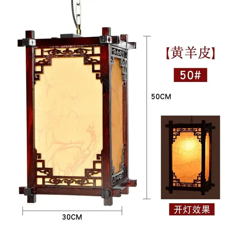 Decorbites chinese style wood pendant light with dark reddish brown frame and amber sheepskin lampshade