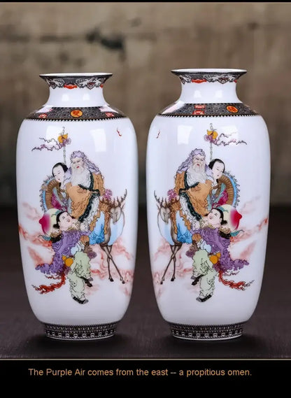 Pair of white porcelain chinese traditional ceramic vases with hand-painted deities and black borders for home decor