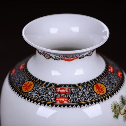 A white ceramic DecorBites™ vase with black red gold floral motifs and chinese traditional characters for home decor