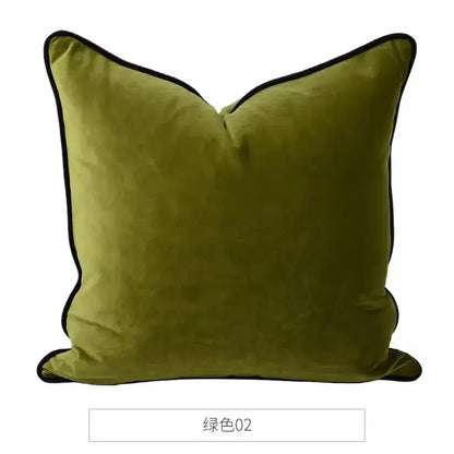 Olive green velvet pillow with black trim from decorbites chinoiserie monkey umbrella peonies roses collection