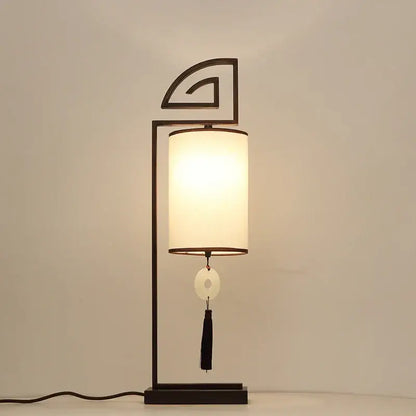 Black metal floor lamp with off-white fabric shade and jade disc tassel decorbites chinoiserie table floor lamp