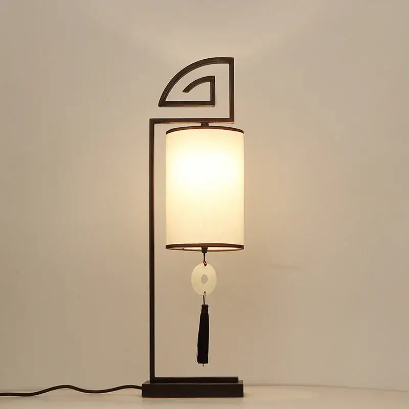 Black metal floor lamp with off-white fabric shade and jade disc tassel decorbites chinoiserie table floor lamp