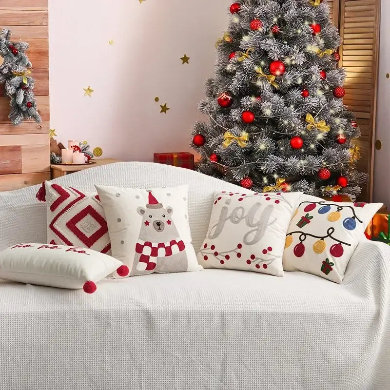 A cozy white couch with decorbites christmas bell red geometric tufted pillow covers for holiday party decor