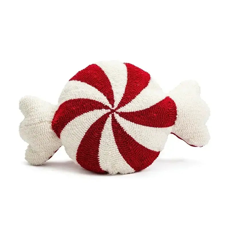 A plush red and white peppermint candy cushion cover with textured tufted surface from decorbites christmas cartoon collection