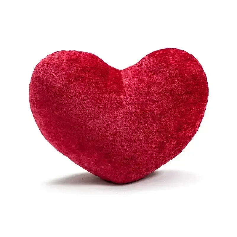 A plush red velvet heart-shaped cushion cover from decorbites christmas cartoon candy festival collection
