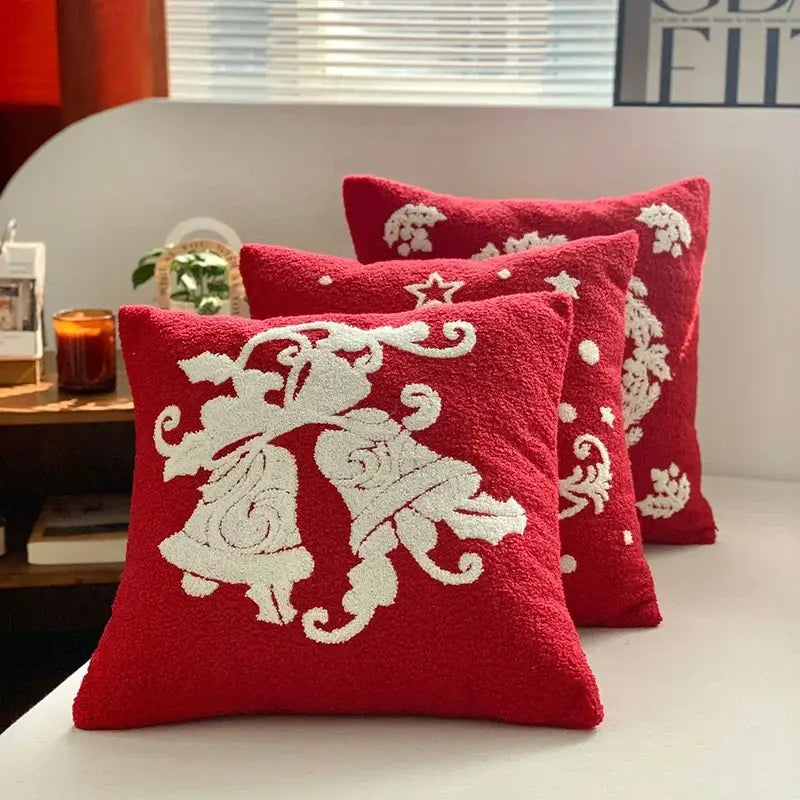 Red throw pillow with white embroidered bells and stars in decorbites christmas cartoon embroidered pillow cover set