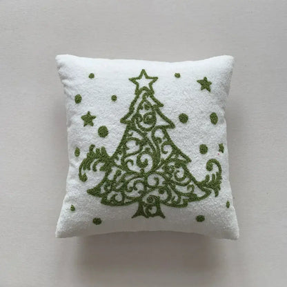 White plush embroidered pillow featuring an ornate olive green christmas cartoon embroidered tree by decorbites christmas cartoon