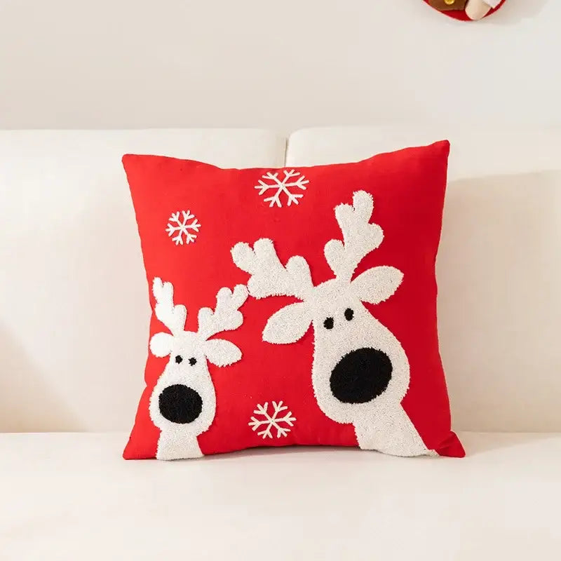 Red cushion pillow cover with embroidered white reindeer and snowflakes from decorbites christmas cartoon letter collection