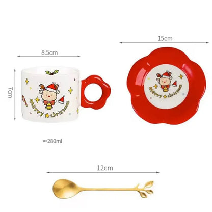 White ceramic mug with red flower handle and festive reindeer design from decorbites christmas ceramic santa tea set