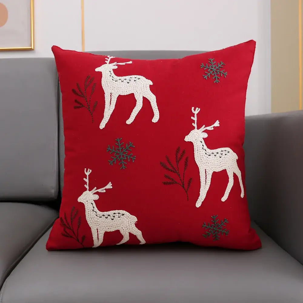 Red cushion cover with embroidered white reindeer and gray snowflakes for decorbites christmas décor 45x45cm