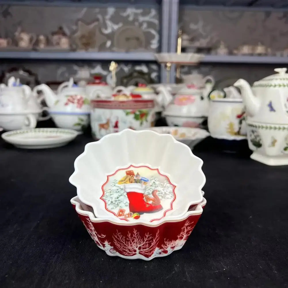 Red and white ceramic bowl with scalloped edges featuring a festive red stocking design from decorbites christmas dinnerware set
