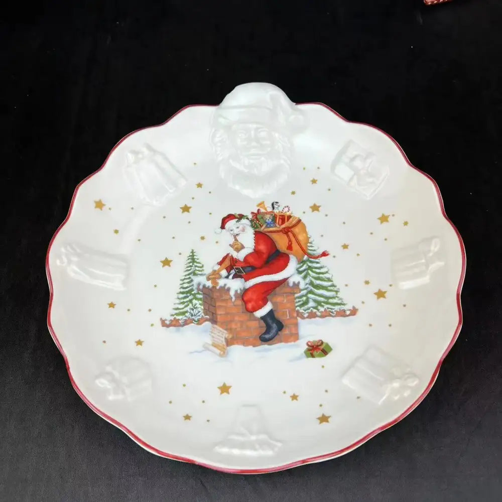 White ceramic christmas plate with raised santa and embossed chimney scene from decorbites christmas dinnerware set
