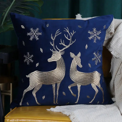 Deep blue velvet cushion cover with intricate silver and metallic thread christmas elk embroidered snowflake design by decorbites