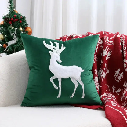 Deep green velvet pillow cover with white embroidered christmas elk design by decorbites christmas elk 45x45cm