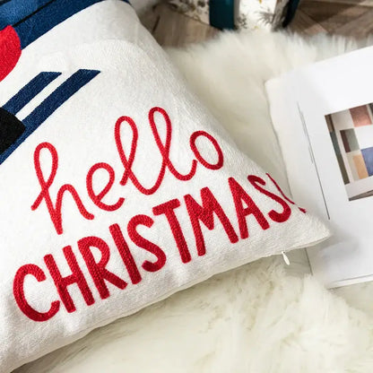 White embroidered pillow cover with red hello christmas text and blue accents decorbites christmas embroidered pillow