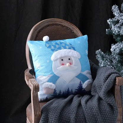 Blue plush decorbites christmas embroidered pillowcase featuring smiling santa with blue hat and scarf in snowy forest