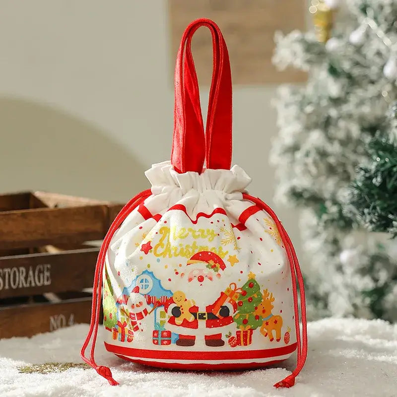 Festive white drawstring decorbites christmas eve apple bag with red velvet handles santa claus design and merry christmas lettering
