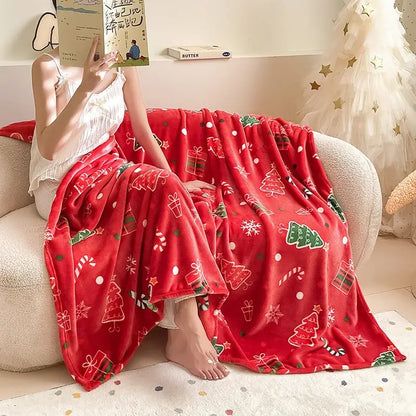 Red plush decorbites christmas flannel blanket with green trees candy canes and gift boxes printed in white