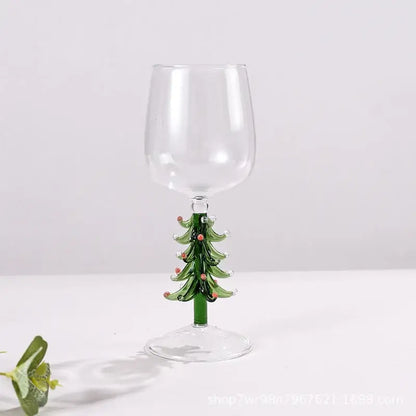 Clear glass goblet with green christmas tree stem and red ornaments from decorbites glass goblet set for festive use
