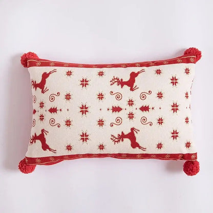 Cream-colored pillow cover with red embroidered reindeer stars trees and pom-poms decorbites christmas jacquard elk design