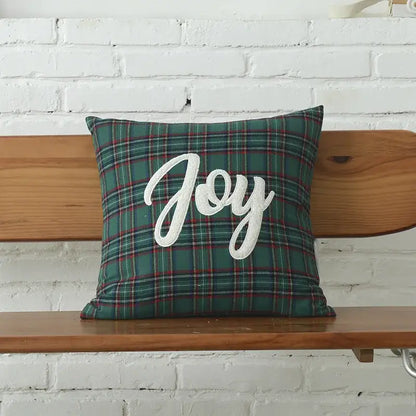 Green plaid throw pillow with white decorbites christmas letter embroidery spelling joy in a letter embroidery plaid design