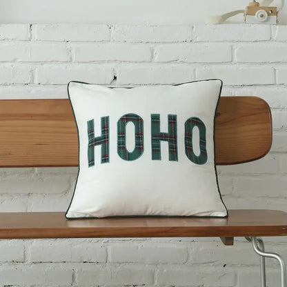 White square pillow with ho ho in bold green plaid letters and black stitched border from decorbites christmas letter embroidery plaid set