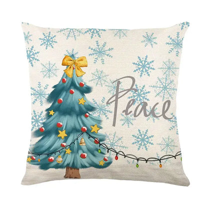 Beige linen pillow cover with decorbites christmas letter print featuring teal christmas tree and peace script design