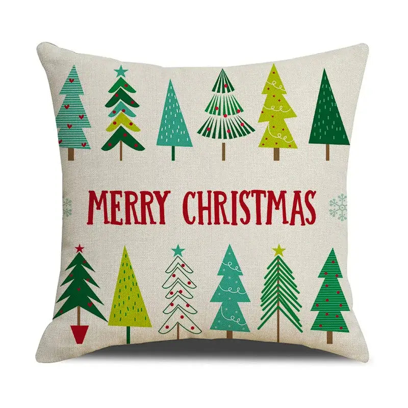 Beige linen cushion cover with festive green and teal christmas trees and red merry christmas text by decorbites christmas linen
