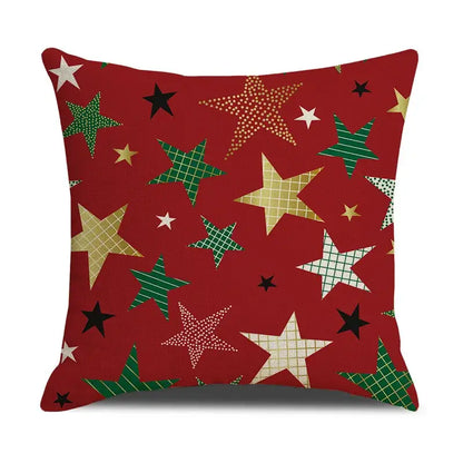 Red throw pillow cushion cover with festive star pattern in green gold black and white from DecorBites Christmas linen collection