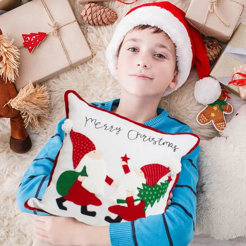 White christmas-themed decorbites christmas patchwork pillow cover with embroidered snowflake and festive appliqué details