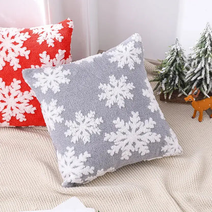 Gray pillow cover with embroidered white snowflake pattern in textured knit fabric from decorbites christmas patchwork collection