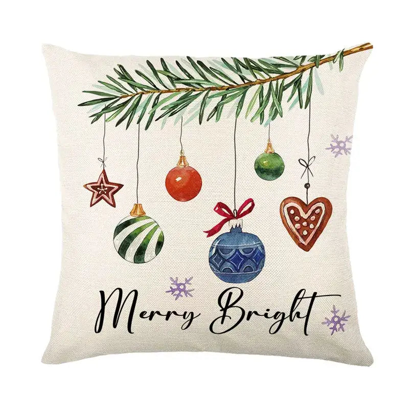 Beige linen decorbites christmas pillowcase featuring festive ornaments and pine branches with merry bright script