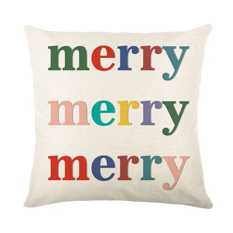 Cozy off-white linen pillow with merry printed thrice in playful colors from decorbites christmas pillowcase collection