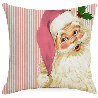 Square throw pillow with vintage santa claus illustration and snowman print on pink striped fabric for living room decor