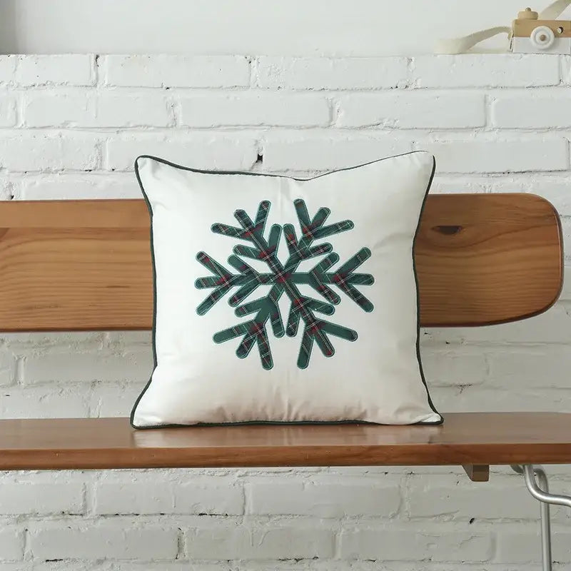 White cushion cover with green plaid snowflake embroidery and black trim made from christmas plaid cotton by decorbites christmas plaid