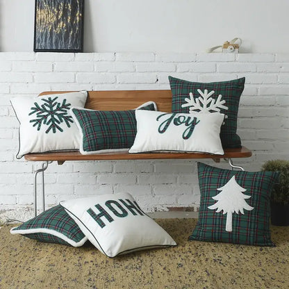 Set of DecorBites Christmas plaid cotton cushion covers in green and white with embroidered snowflakes and holiday text