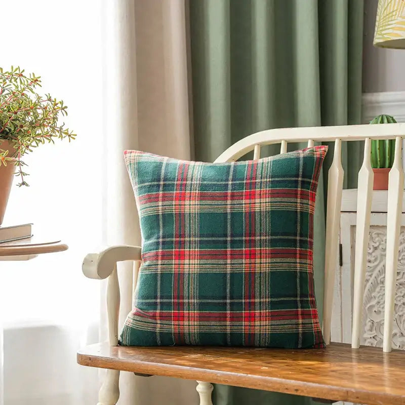 A cozy decorbites christmas plaid cushion cover with classic deep green red and beige tones for festive holiday decor